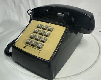 Teléfono de escritorio vintage negro con botones pulsadores Comdial - Negro