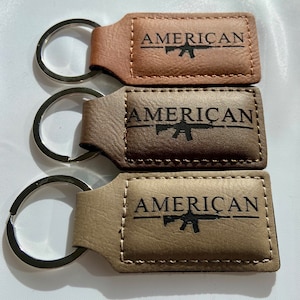Amerikansk pistolnyckelring i konstläder, patriotisk gevärsnyckelring