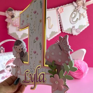 cake topper number one made with premium cardstock and photo paper ideal for a fairy first birthday