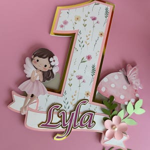 cake topper number one made with premium cardstock and photo paper ideal for a fairy first birthday