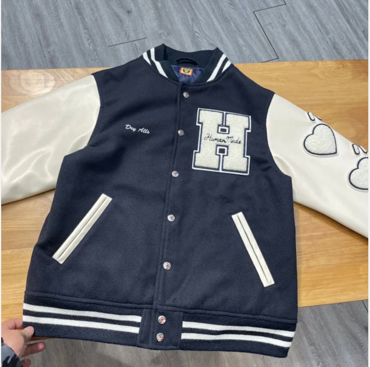 METCHA  Check how stylist Nigo reinterpreted varsity jackets.