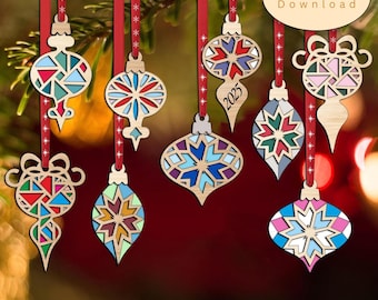 May include: A collection of eight wooden Christmas ornaments with geometric cutouts and colorful inlays, hanging from red ribbons. One ornament features the year 2025. The set includes various shapes like teardrops and spheres with intricate patterns.