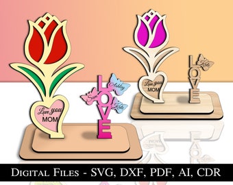 May include: Three laser cut wooden flower designs with the word "LOVE" and butterflies. The flowers have hearts with the text "Love you MOM" and names like "Sam", "Ashley", and "Kate".