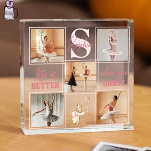 May include: A clear acrylic block featuring ballet-themed photos and text. The block includes the name "Sophia" and the phrases "life is BETTER" and "when you DANCE" in pink. The photos showcase ballerinas in various poses.