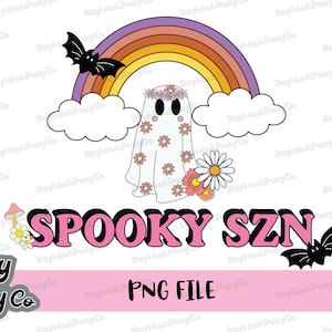 May include: A pink and white ghost with a flower crown stands in front of a rainbow with clouds. The text "SPOOKY SZN" is in pink letters with black outlines. The text "Buy me a Pony Co" is in black letters with a white outline. The text "PNG FILE" is in white letters with a black outline.