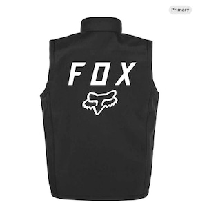May include: Black vest featuring a white "FOX" logo and fox head graphic on the back. The vest has a stand-up collar and a sleeveless design. The material appears to be smooth and durable.