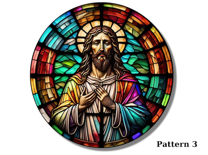 May include: A stained glass window depicting Jesus Christ with a colorful background. The image is circular and features a halo around Jesus' head. The colors in the stained glass are vibrant and include red, blue, green, yellow, and purple.