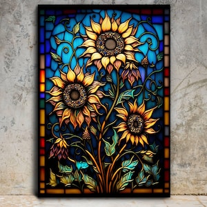 May include: A stained glass window design featuring three sunflowers with yellow petals and brown centers. The sunflowers are surrounded by green leaves and vines. The background is a blue and purple gradient.