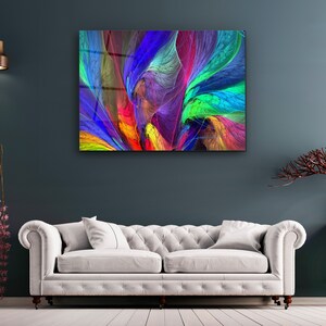 Puede incluir: Impresi&oacute;n de arte abstracto con colores vibrantes de azul, verde, morado, rojo y amarillo. La obra de arte presenta l&iacute;neas y formas que se arremolinan y fluyen.