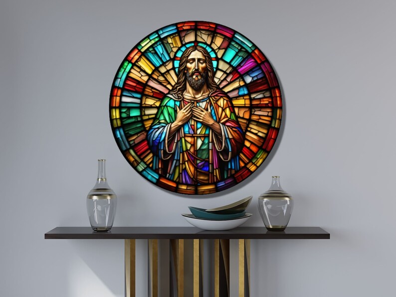May include: A round stained glass window depicting Jesus Christ with a colorful background. The stained glass is in shades of red, orange, yellow, green, blue, purple, and white.