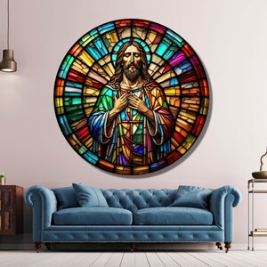 May include: A stained glass window depicting Jesus Christ with a colorful background. The window is round and has a halo around Jesus' head.