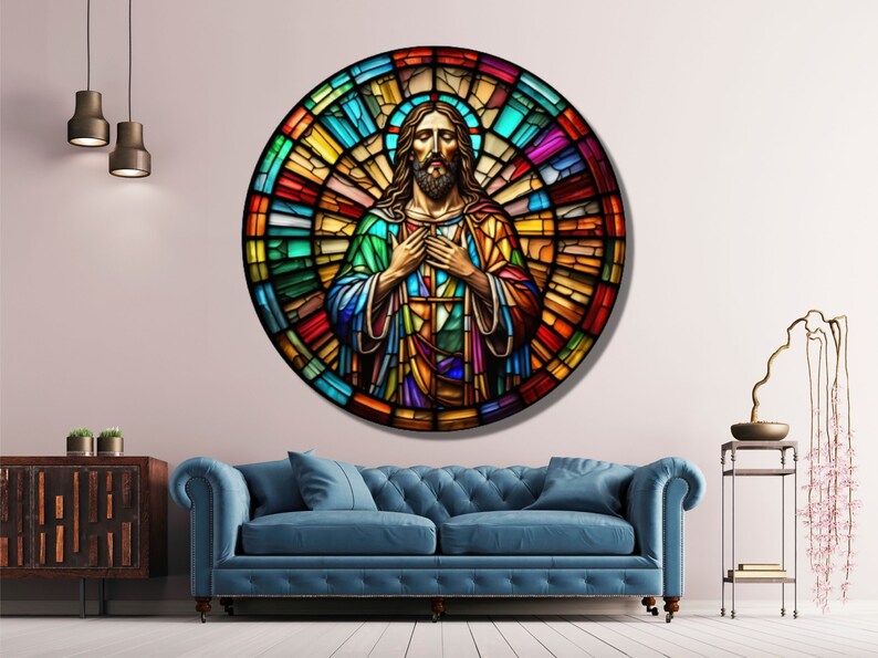 May include: A stained glass window depicting Jesus Christ with a colorful background. The window is round and has a halo around Jesus' head.