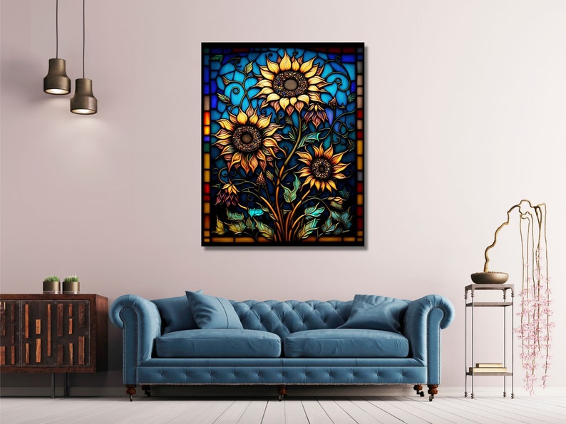 Puede incluir: Un dise&ntilde;o de vitral con tres girasoles con p&eacute;talos amarillos y centros marrones. Los girasoles est&aacute;n rodeados de hojas verdes y enredaderas. El fondo es un degradado azul y verde con un borde rojo y naranja.