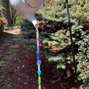Garden Art Upcycled Tea Pot with pouring sun-catching beads. Make a great Mother's Day, Bday or Housewarming gift. One of a kind gift.