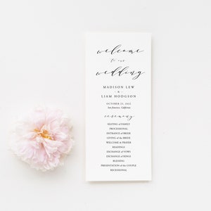 May include: A wedding ceremony order of service with the names Madison Lew and Liam Hodgson, the date October 25, 2022, and a list of the ceremony events.