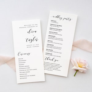 May include: A wedding ceremony programme with the names "Olivia + Taylor" and the date "August 25, 2025" printed on the front. The back of the programme lists the wedding party and a thank you message.