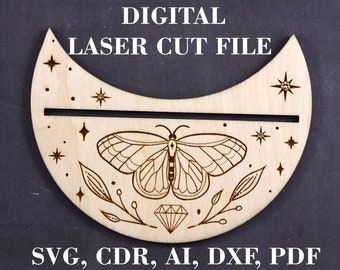 May include: Digital laser cut file for a crescent moon design with a butterfly, leaves, and a diamond. The file is available in SVG, CDR, AI, DXF, and PDF formats.