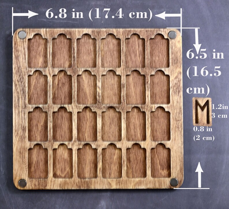 May include: A wooden tag holder with 25 slots, measuring 6.8 inches by 6.5 inches. The holder is made of brown wood and has a natural finish.