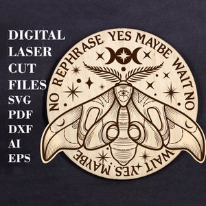 May include: A wooden round sign with a black and white illustration of a moth with a third eye. The sign has the text "No Rephrase Yes Maybe Wait No" written around the edge.