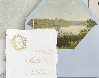 May include: Save the date card with a gold monogram and the text "Save the Date for the wedding of Annabelle Wilding and Jack Kirkwood Saturday the Second of June MMXXIII Wiltshire, England Formal invitation to follow"