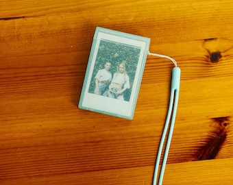 Cyan Glitter Instax Mini Photo Case: Portable Plastic Holder