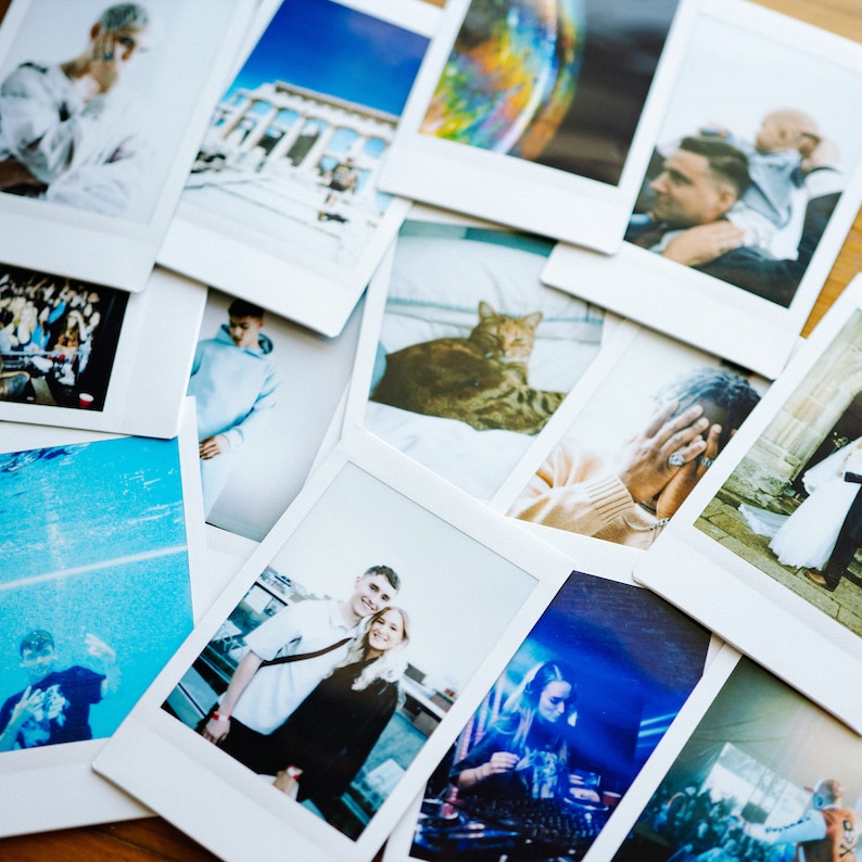 May include: A collection of Polaroid photos, some with people, some with animals, and some with landscapes. The photos are arranged in a random order and are all different sizes.