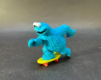 Cookie Monster skateboarding pvc figurine. Sesame Street. Applause 1980’s