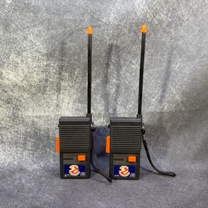 Walkie Talkie de estado sólido de Los Verdaderos Cazafantasmas. Funciona. Fabricado por Justin Products, 1988. (Leer descripción) Difícil de encontrar.