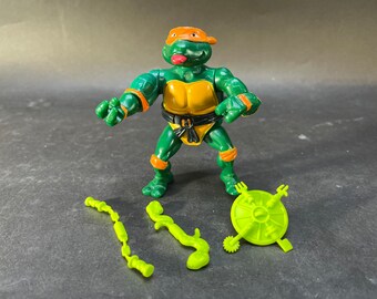 TMNT action figure : Wacky action Micheal Angelo .  100% Complete. Playmates 1989.
