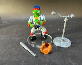 TMNT action figure :  Sewer sports all star, Grand Slammin&#39; Raph 100% complete. Playmates 1991