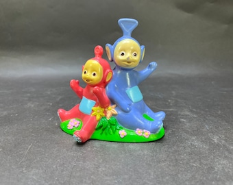 Teletubbies figures.  Tinky Winky and Po.