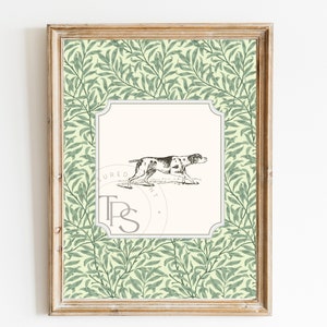 May include: A framed print with a green and white floral pattern. The print features a black and white illustration of a dog running. The print also includes the text "Assured Print" and a logo with the letters "T&S".