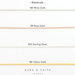 May include: Four different chain styles in 18K white gold, 18K rose gold, 925 sterling silver, and 18K yellow gold. The text "Materials" and "AURA & FAITH LONDON" is visible at the top and bottom of the image.