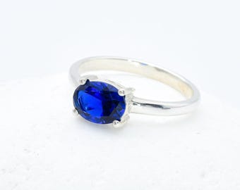 Anillo de zafiro azul, anillo de compromiso de zafiro, anillo de zafiro ovalado, zafiro creado, anillo solitario azul, anillo de promesa de zafiro, plata maciza
