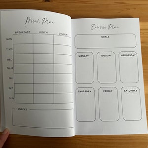 May include: A blank meal planner and exercise planner with sections for each day of the week. The meal planner has sections for breakfast, lunch, and dinner. The exercise planner has a section for goals and a section for each day of the week.