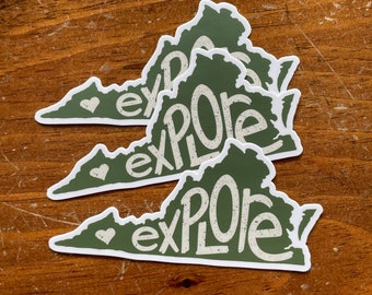 May include: Three green vinyl stickers shaped like the state of Virginia with the word "Explore" written in white on each sticker. Each sticker has a small white heart in the top left corner.
