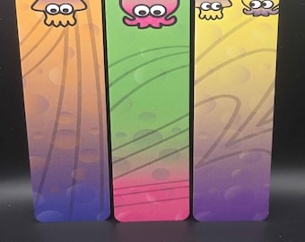 Marcapáginas inspirados en Splatoon, accesorios de lectura brillantes de doble cara.