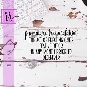 May include: A white wooden surface with a keyboard, coffee cup, and glasses. The image includes the text "premature treejaculation: THE ACT OF ERECTING ONE'S FESTIVE DECOR IN ANY MONTH PRIOR TO DECEMBER."
