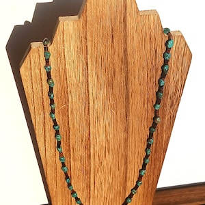 Beautiful vintage heishi necklace with natural turquoise nuggets and shell beads.  Simple but elegant with authentic (tested) turquoise.