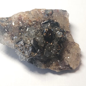 Ruby sphalerite gems up to 1/2" surrounded by showy quartz clusters, 100g.  From the famous Picher Field OK mine region.