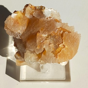 Golden 'Pinecone' calcite from the Williamsville Quarry, Poplar Bluff MO, 126g.  A fine specimen with stepped layers typical of this locale.