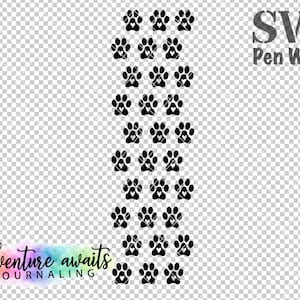 May include: Black and white paw print design with a small heart in each paw print. The design is repeated vertically and says "adventure awaits journaling" at the bottom. This design is for a pen wrap.