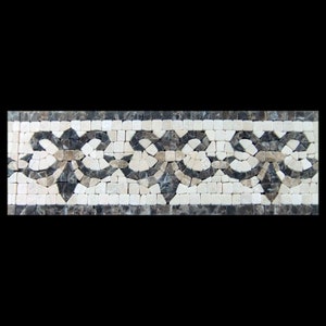 May include: A decorative mosaic tile border with a repeating pattern of black and white swirls. The border is made of small, square tiles.
