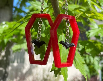 Open Coffin Earring with Bats, Skulls, ghost & Spiders. Custom earrings can be made in French hook, clip-ons or stud dangles!