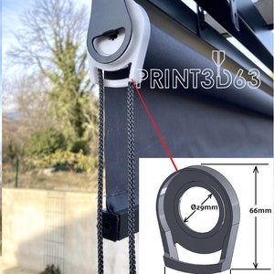 Puede incluir: Un sistema de persiana enrollable en blanco y negro con una polea blanca y una cuerda negra. La imagen incluye un diagrama detallado de un componente de polea, que muestra dimensiones de 39 mm de ancho, 66 mm de alto y una abertura de 29 mm de diámetro. El texto "PRINT3D63" es visible.