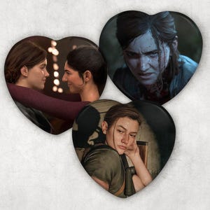 The Last of Us Pt II Heart Shaped Pinback Buttons | Dina, Ellie Williams and Abby Anderson Pins