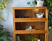 Restored barrister bookcase warm wood and 4 cabinets with sliding glass doors