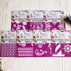 May include: Eight different silkscreen stencil designs on pink cardstock. The designs include botanical, western boho, mosaic, patterns, mandala, floral, and nautical.