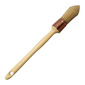 May include: Angled paint brush with a cream-colored handle and natural bristles. The brush head is secured with a copper-colored ferrule. The handle has a hole for hanging. Ideal for painting furniture and craft projects.