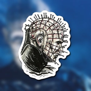 May include: A sticker featuring a black and white illustration of a character with a grid-like structure and nails embedded in their head. The character is depicted in profile, with a stern expression. The background is a gradient of blue.
